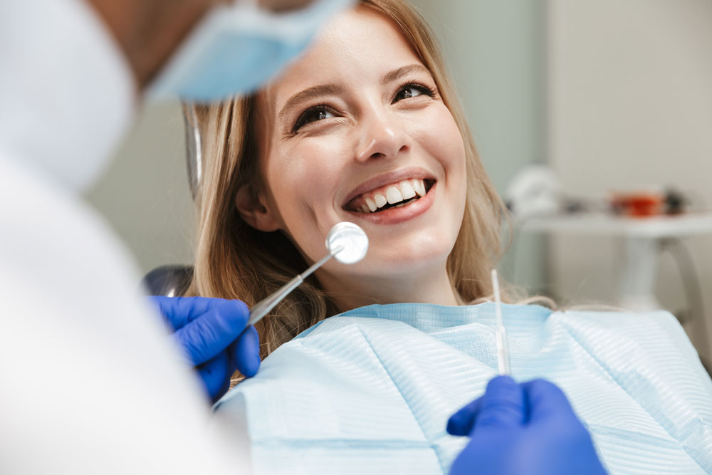 woman sitting in dental chair